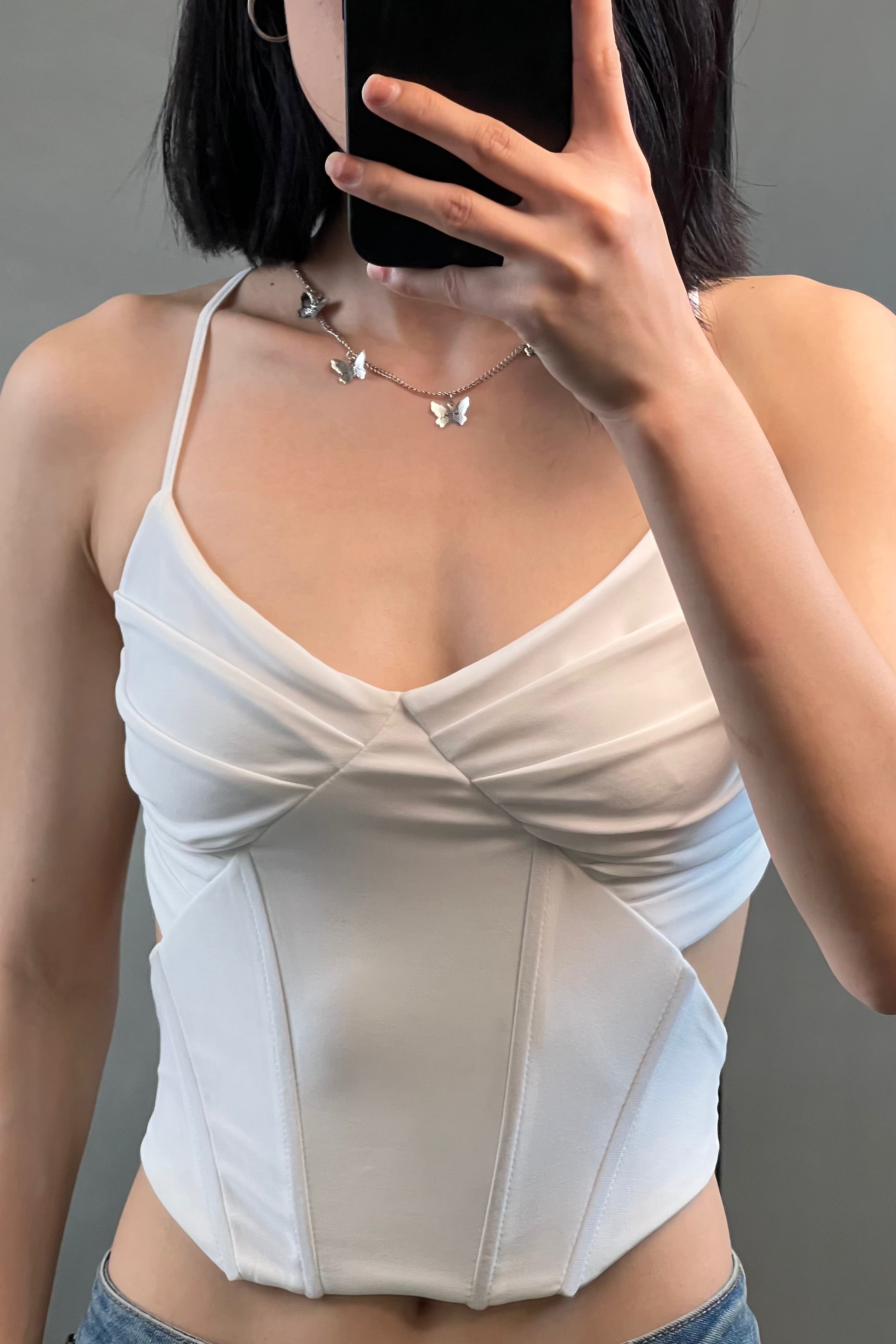 Women wearing the white Selene corset by Beeglee – elegant ruched bust and structured fit for a flattering silhouette.