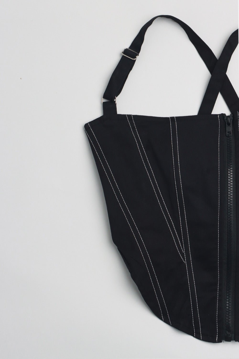 A black CEO zip-up corset in cotton twill – edgy structured design by Beeglee