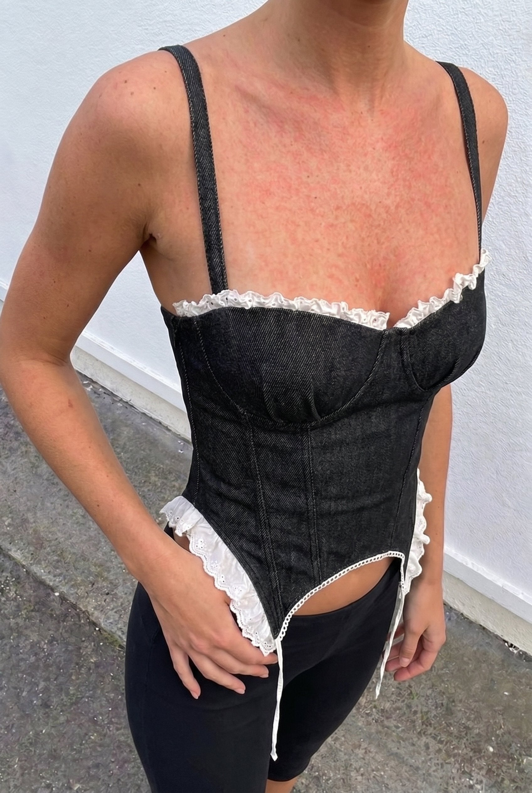 Black Crush Denim Corset — angled view of underwired cups