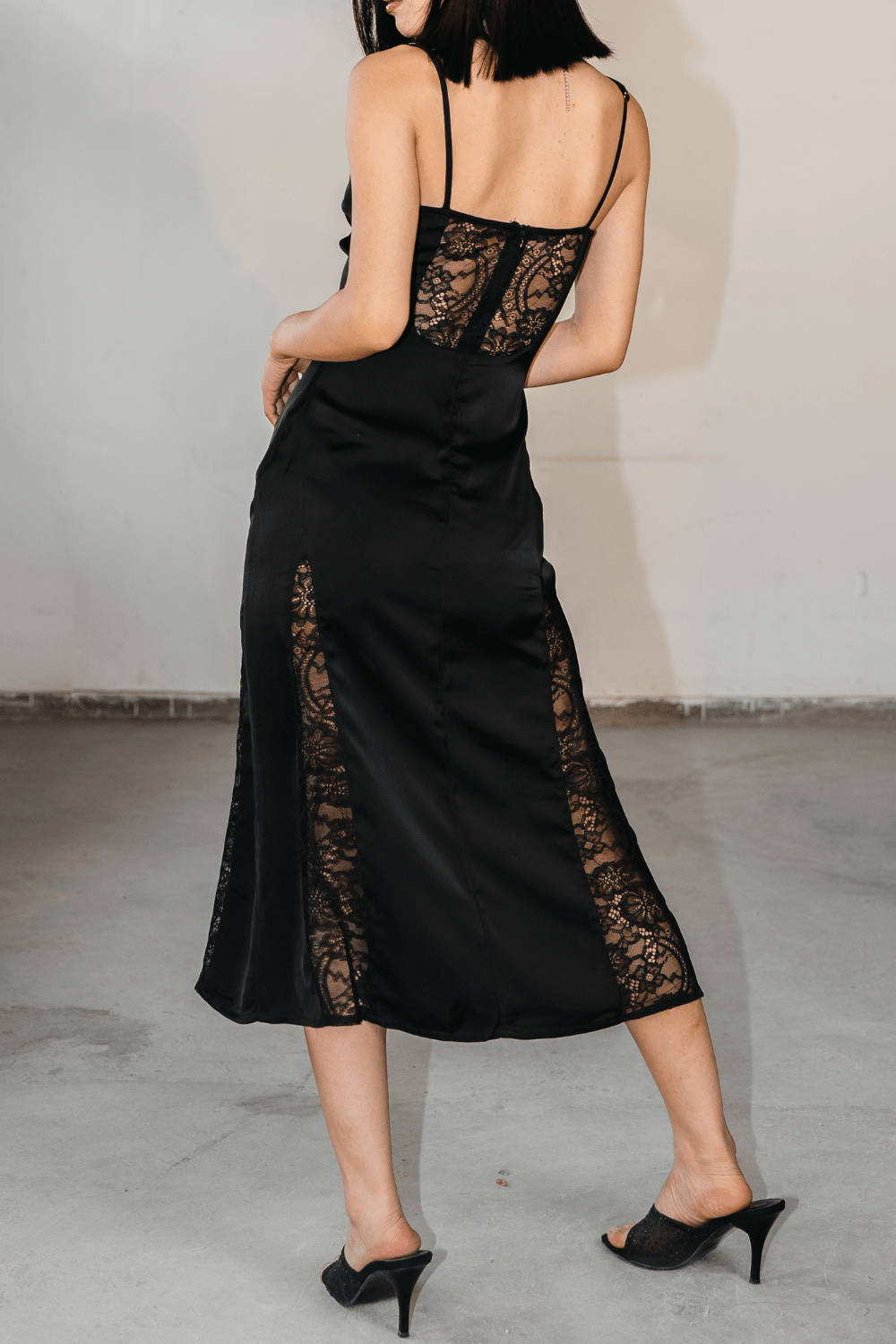 Back design of lace midi dress – romantic and graceful look in black