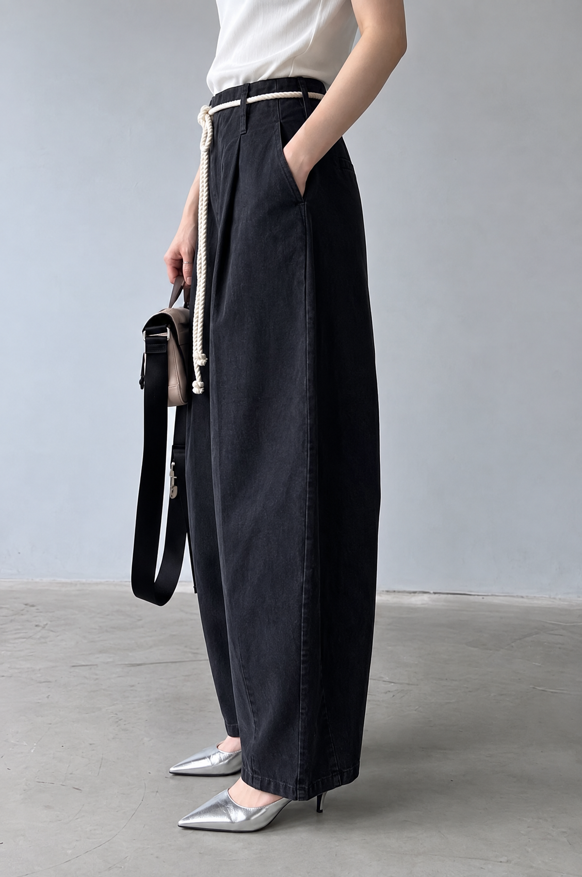 Black Rope Barrel Pants side view showing curved barrel leg and slant pocket