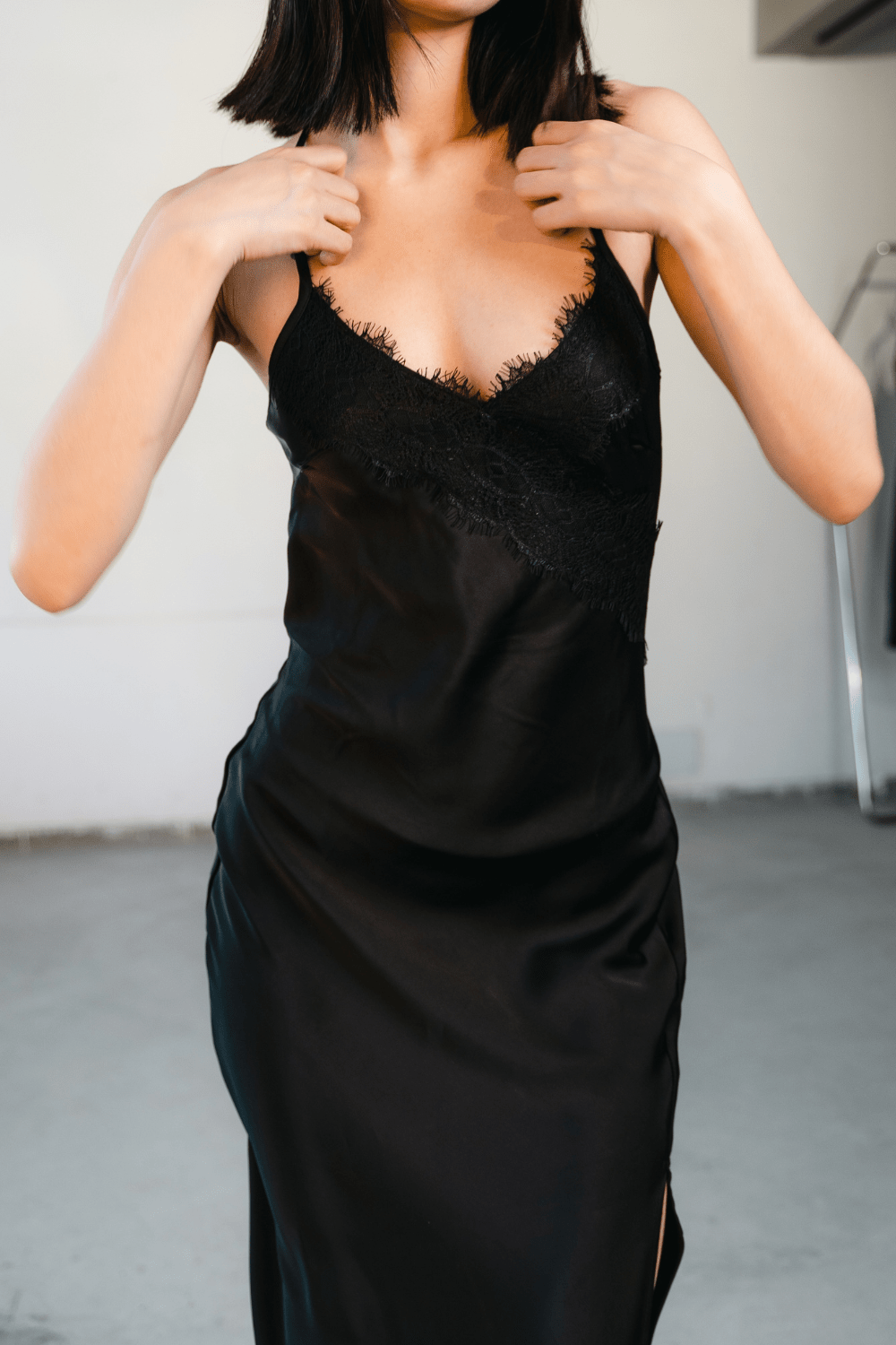 Woman wearing a black maxi dress – elegant evening wear for women from Beeglee