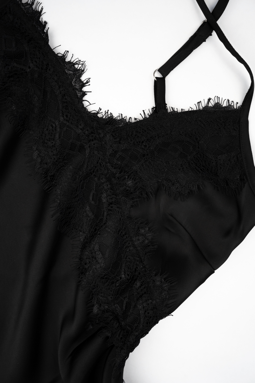 Close-up of black maxi dress fabric smooth, premium finish with elegant detail