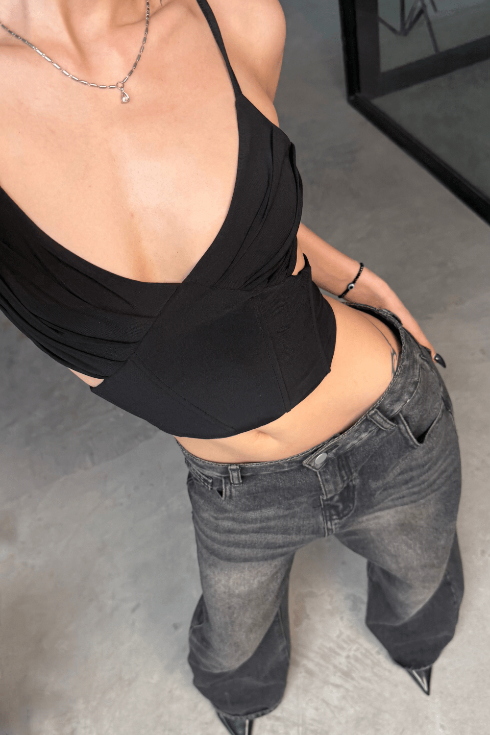 Women wearing the black Selene corset by Beeglee – elegant ruched bust and structured fit for a flattering silhouette.