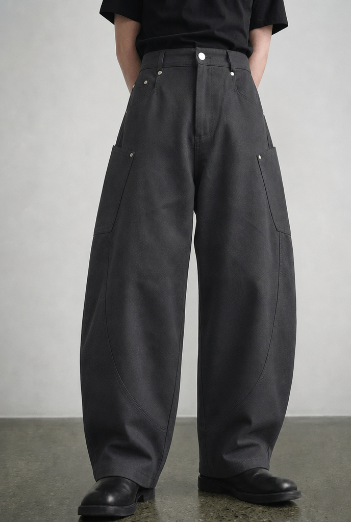 Grey carpenter pants front view, wide barrel leg, on model