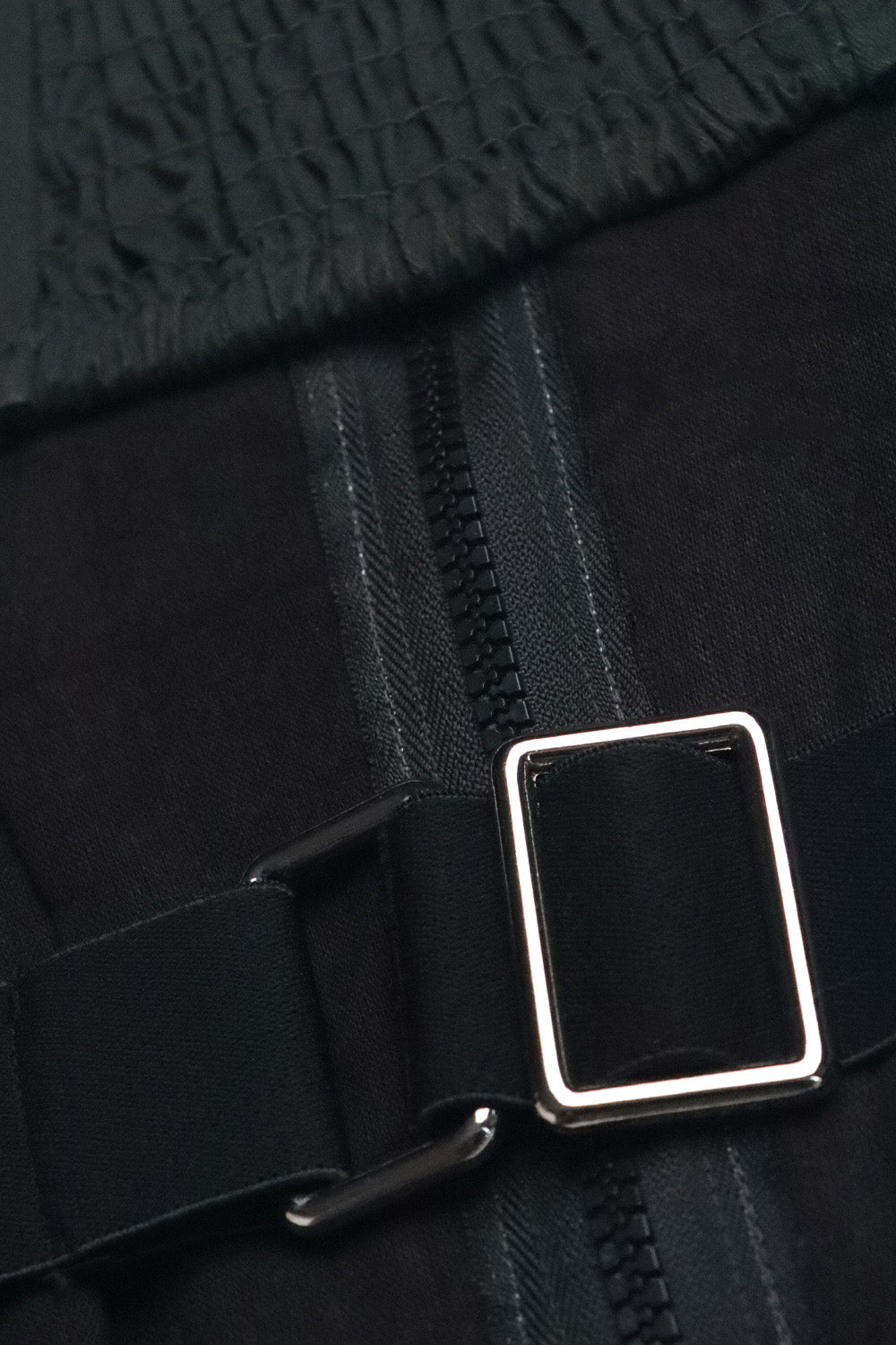 A olive CEO zip-up corset in cotton twill – edgy structured design by Beeglee