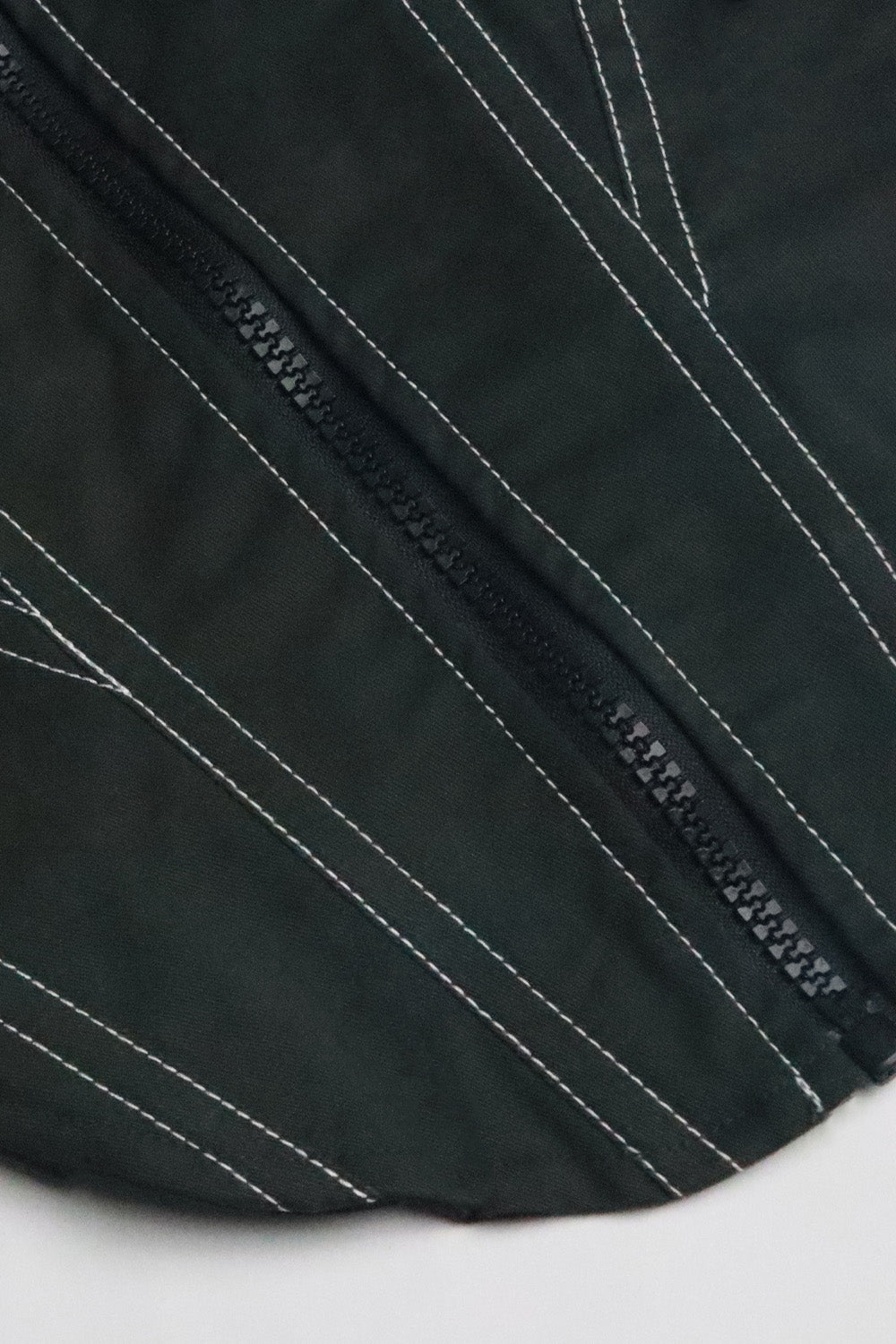 A olive CEO zip-up corset in cotton twill – edgy structured design by Beeglee