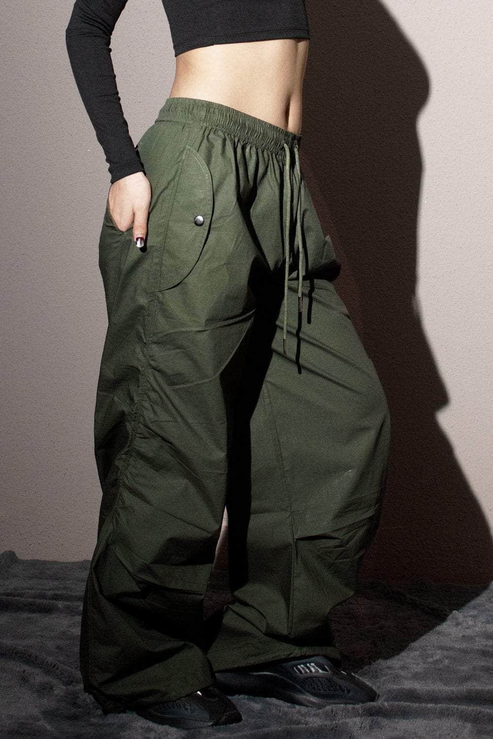 http://www.beeglee.in/cdn/shop/products/olive-flared-parachute-pants-358427.jpg?v=1706793546&width=2048