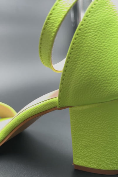 green matte heels with buckle closure